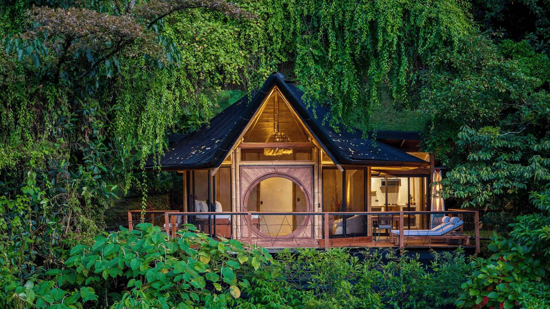 Eco-lodge surrounded by lush greenery in Monteverde, Costa Rica.